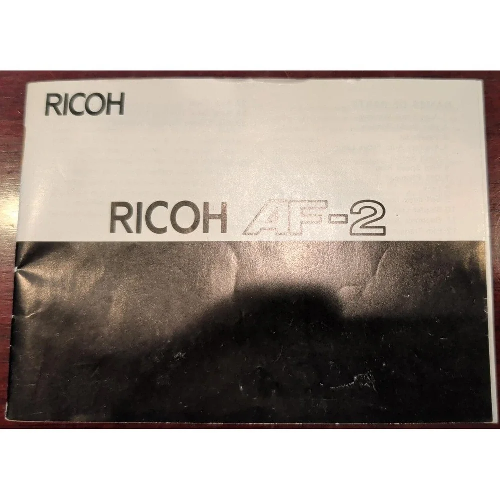 Ricoh AF-2 35mm Film Camera 38mm f2.8 Rikenon Lens Auto Focus Vtg Japan Black